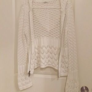 Hooded crochet sweater.